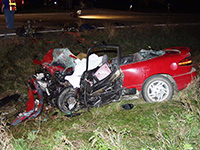 Photo of a car crash scene.
