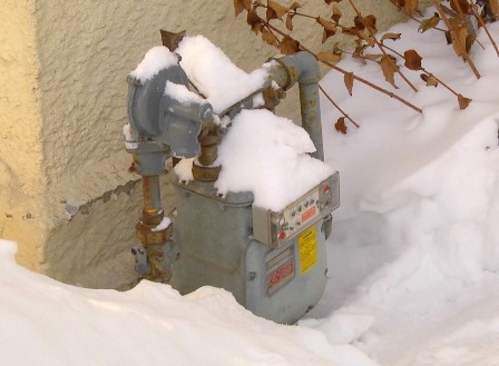 snow on a residential gas meter