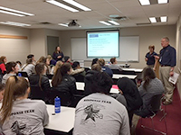 Photo of HSEM staff sharing their expertise in disaster recovery and emergency services with future health-care workers.