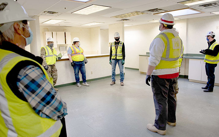 A work group tours a potential alternate care site