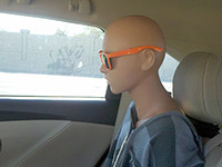 Photo of a mannequin that was used as a passenger for the MnPASS lane.