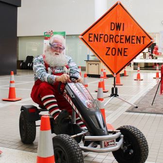 Santa on an obstacle course showing effects of driving while intoxicated