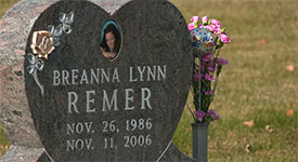 Breanna Remer's headstone with a photo of her and her birth and death dates