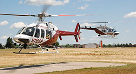 Two Minnesota State Patrol helicopters hovering