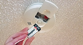 Putting a battery in a smoke alarm