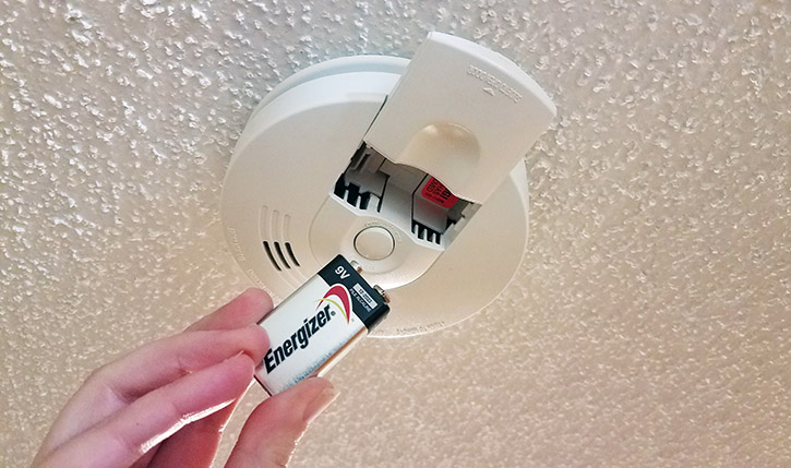 Putting a battery in a smoke alarm