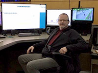 911 dispatcher Marty O’Hehir at his desk