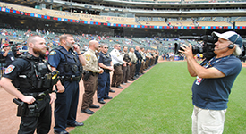 DWI all stars line up on the first base line at Target Field to have their photo taken.