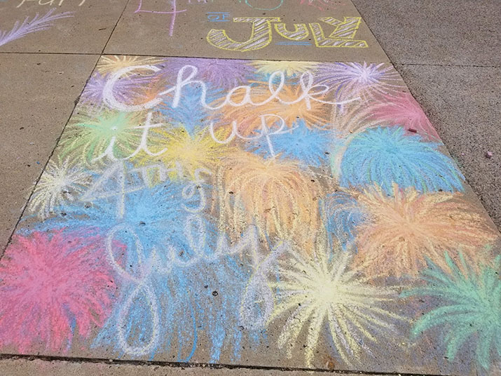 Sidewalk chalk art of fireworks