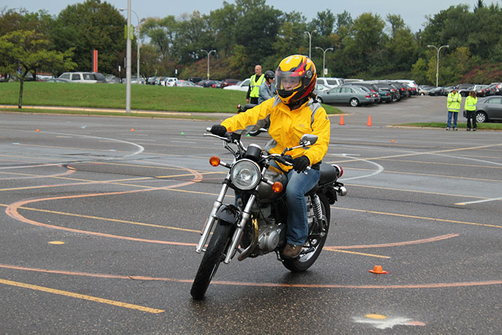 A rider navigates a motorcycle training course
