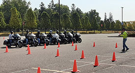 A RiderCoach instructing a motorcycle training class