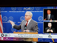 A TV screen showing Gov. Tim Walz during a news conference being broadcast on TPT 