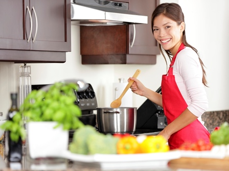 Woman cooking in kitchen