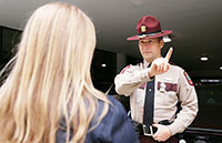 A Minnesota State Trooper demonstrates a field sobriety test.