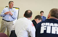 Minnesota State Fire Marshal Bruce West welcomes firefighters to one of several listening sessions around the state.