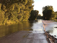 Floodwater over a rural road