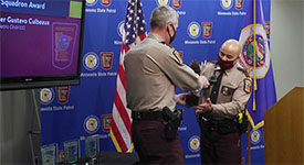 Col. Matt Langer (left) presents the Eagle Squadron Award to Trp. Gustavo Culbeaux during the 2021 State Patrol Awards on Feb. 24