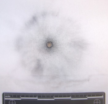 The pattern of gunshot residue on a cloth target after firing.