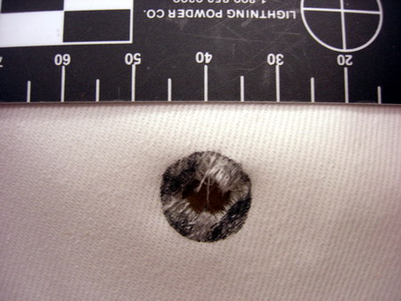 a bullet hole that is to be tested with sodium rhodizonate solution