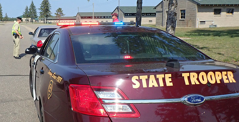 A trooper candidate practicing a traffic stop during the training academy.