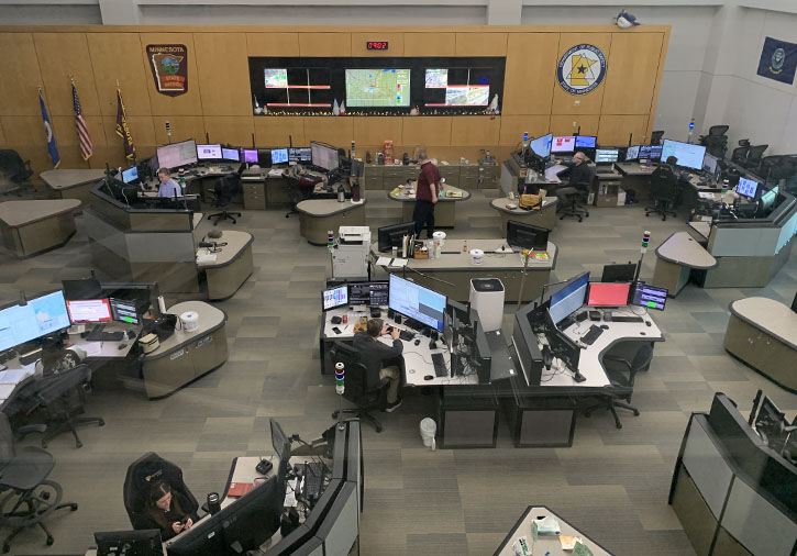 An overhead view of a 911 dispatch center