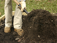A person digging.