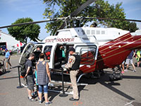 Fairgoers get an up-close look at a state patrol helicopter.