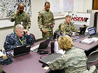 Photo of National Guard Staff in the SEOC during Super Bowl. 